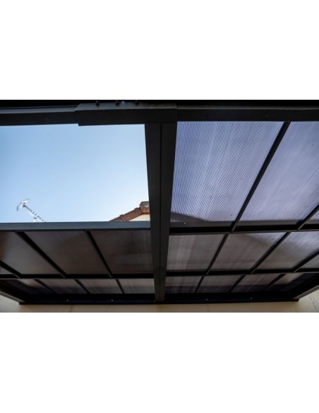 HABRITA - Pergola adossée aluminium toit polycarbonate + rideau sous toit - 15.38 m² 